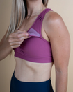 front view of active mum wearing pink rouched breastfeeding sports bra