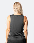 back view of an active mum wearing a raven breastfeeding top