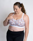 Happy active mom wearing maternity sports bra for large cup sizes