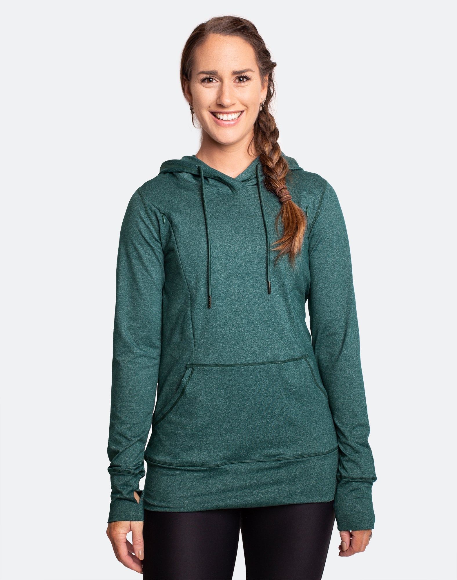 Happy mum wearing a green breastfeeding hoodie