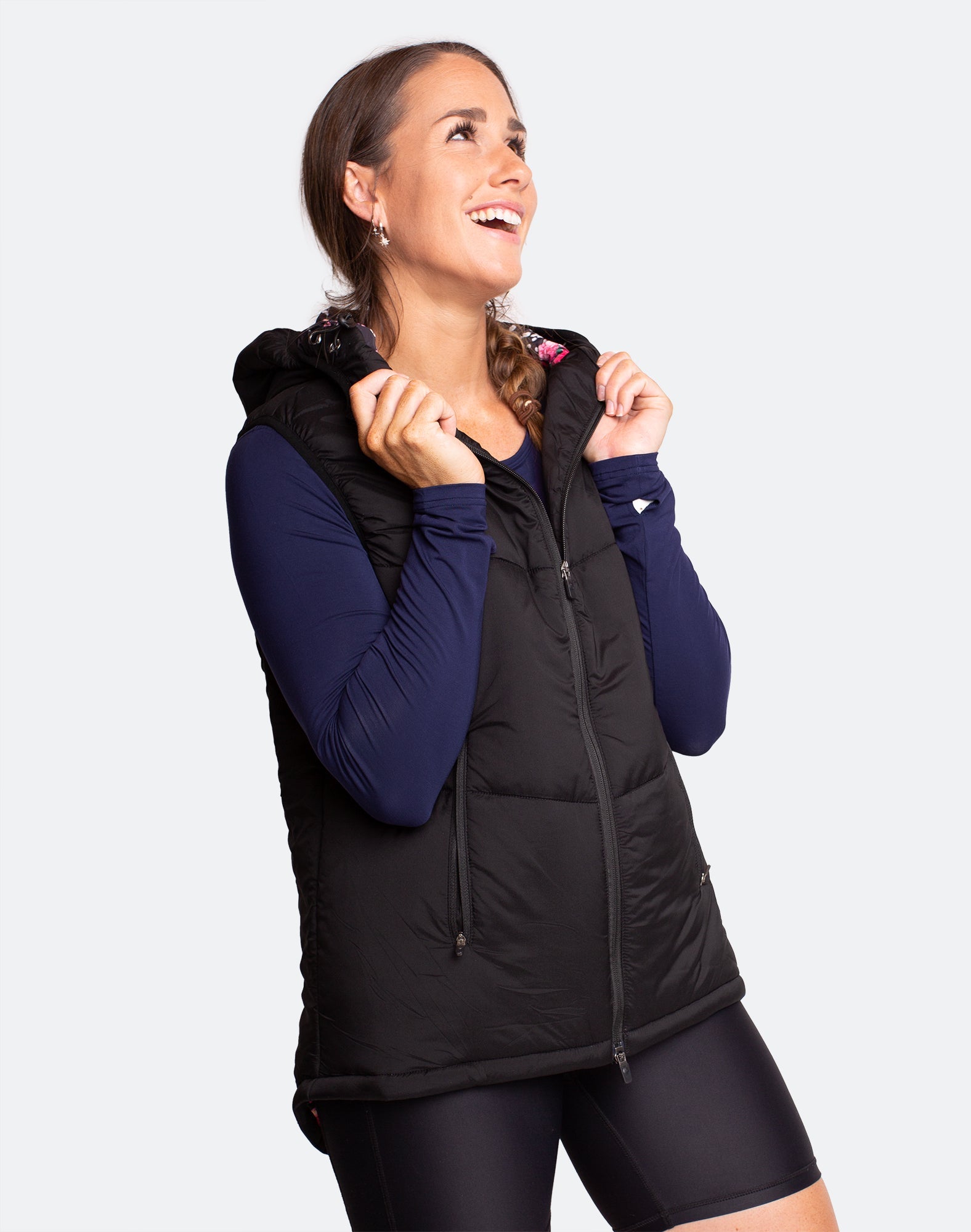 Black women&#39;s puffer vest with hood