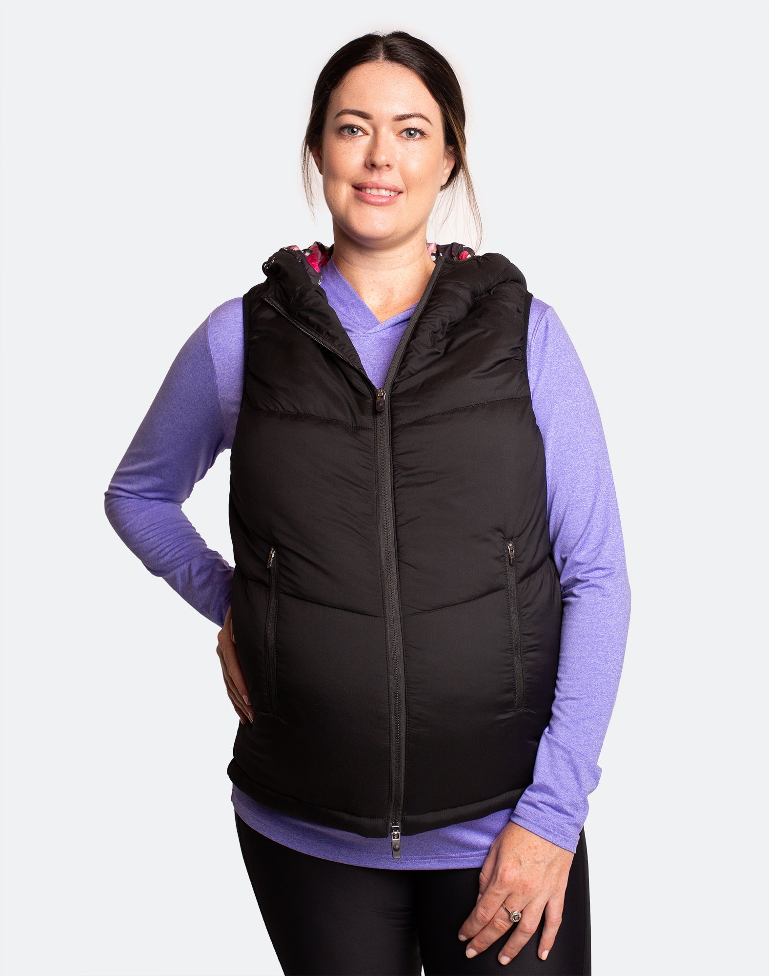 Front view of black women&#39;s puffer vest