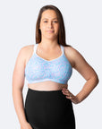 Pregnant mum wearing confetti print soft cup sports bra