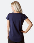 Back view fit mum wearing nursing tee