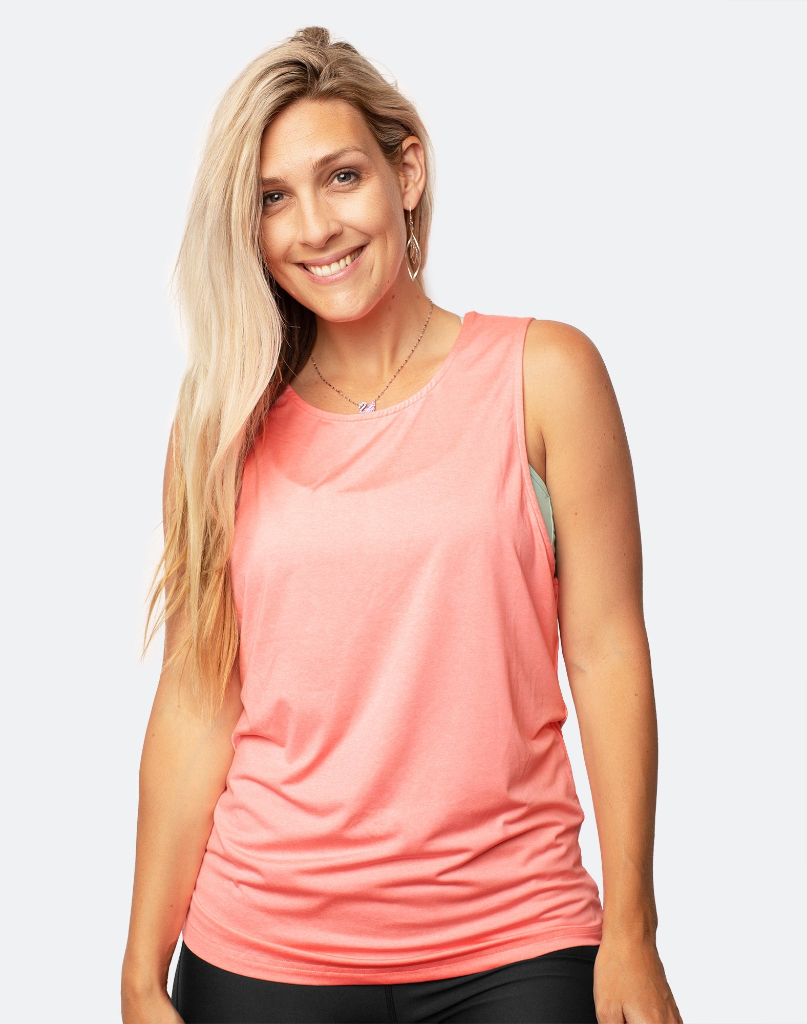 Front view of happy, active mum wearing breastfeeding tank