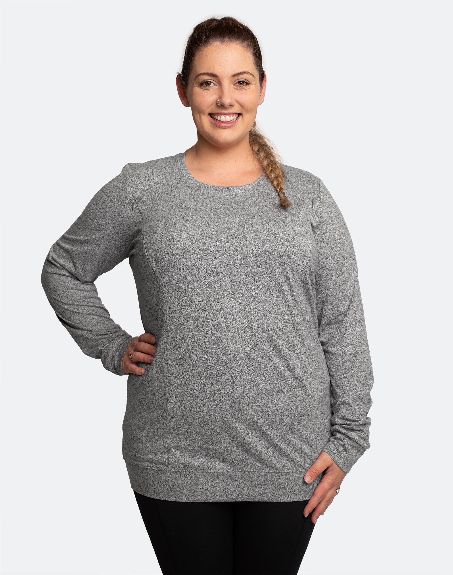 Happy mum wearing a grey nursing jumper with easy access breastfeeding zips