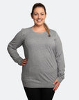 Happy mum wearing a grey nursing jumper with easy access breastfeeding zips