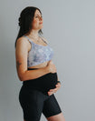 Side view of pregnant women wearing print nursing sports bra