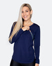 fit mother wearing a stylish blue maternity top with scooped hem