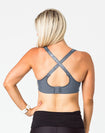 back view of a cute nursing bra with the bra straps crossed over
